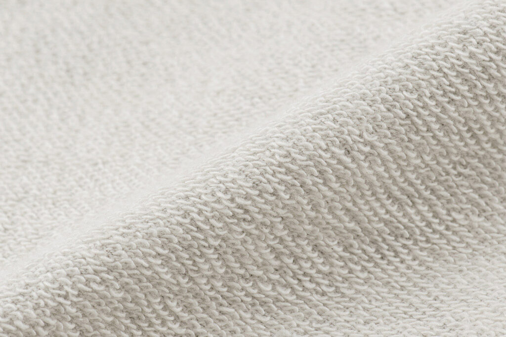 岸和田のプリント加工屋、カジュアルプリント(カジプリ)がオススメするプリントスターのパーカー(品番00216MLH)の裏地(パイル地)拡大写真
品名にライトと付いているように軽めに作られている